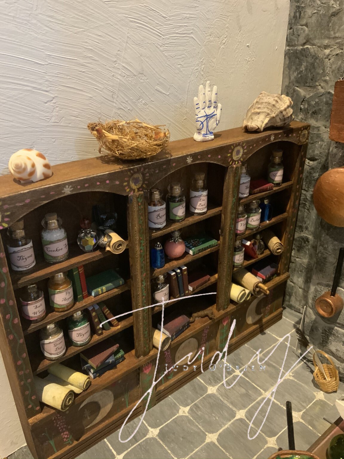 Shelving and objects in Judy's miniature scene